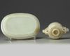 A Chinese white jade ‘twin chilong’ cup stand and a pale celadon jade cup