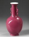 A CHINESE RUBY GLAZED MONOCHROME VASE, QING DYNASTY (1644-1911)