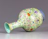 A Chinese famille rose lime green vase