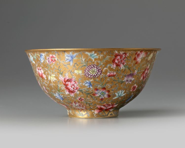 A Chinese gilt-ground famille rose bowl