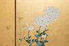 A JAPANESE BYOBU FLOWER GARDEN ON GOLD LEAF, MEIJI PERIOD (1868-1912)