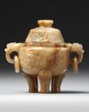 A CHINESE RUSSET JADE TRIPOD CENSER AND COVER 