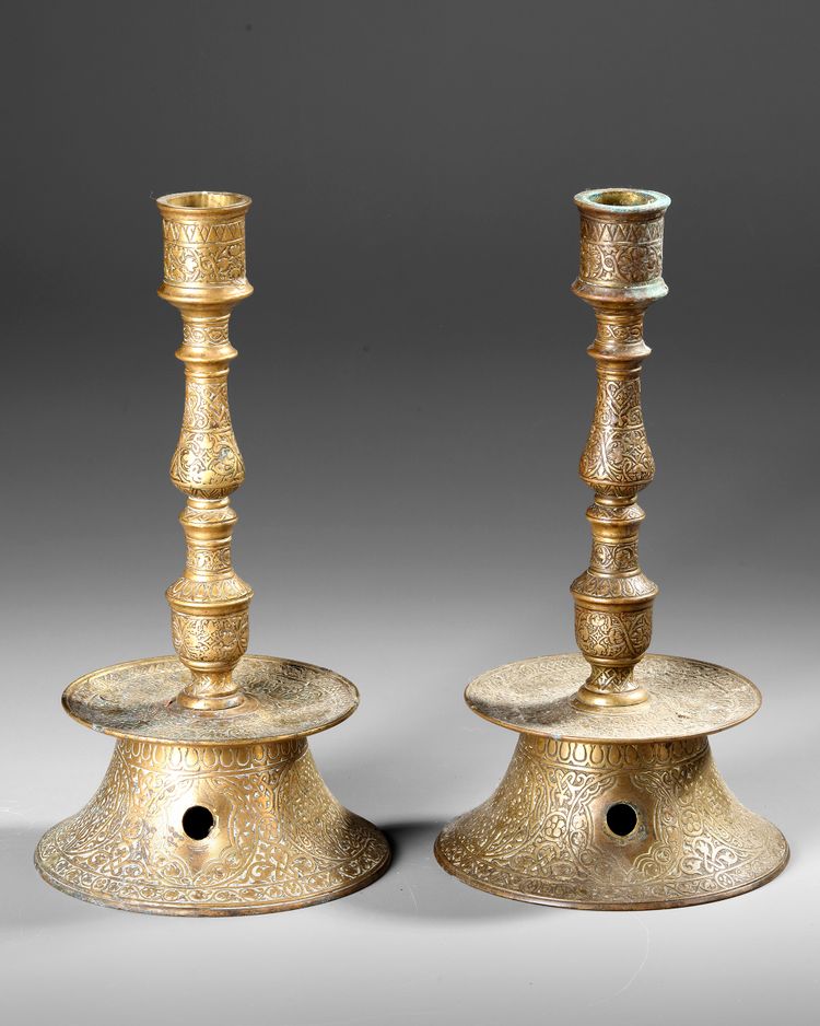 TWO OTTOMAN ENGRAVED BARASS CANDLESTICKS , TURKEY 17TH CENTURY