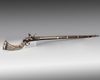 An Islamic Ottoman mother-of-pearl inlaid Miquelet gun
