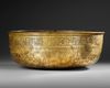 A LARGE AYYUBID SILVER INLAID BRASS BOWL WITH INSCRIPTIONS,  EGYPT OR SYRIA, 13TH CENTURY
