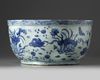 A CHINESE BLUE AND WHITE DUCKS AND LOTUS' BASIN, MING DYNASTY (1368-1644)