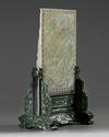 A CHINESE PALE CELADON JADE TABLE SCREEN ON A SPINACH JADE STAND