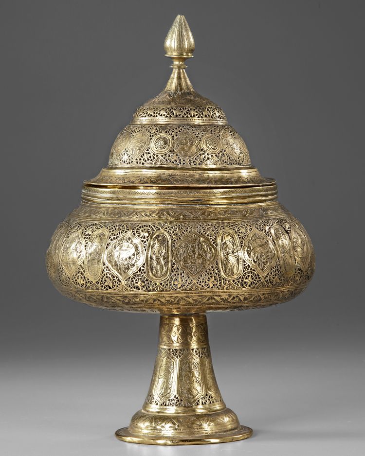 A QAJAR BRASS PIERCED INCENSE BURNER, PERSIA, 19TH CENTURY