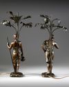 A PAIR OF ORIENTAL 'WATER CARRIERS' SCULPTURES , MARCEL DEBUT