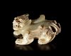 A WHITE JADE CARVING OF PIXIE, CHINA, HAN DYNASTY (206 BC-220 AD)