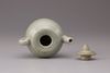 A celadon teapot with cover