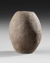 Marind Anim stone mace head.