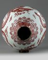 A Chinese underglaze copper-red and blue decorated 'dragon' vase
