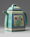 A Chinese famille rose enamelled yixing teapot and cover