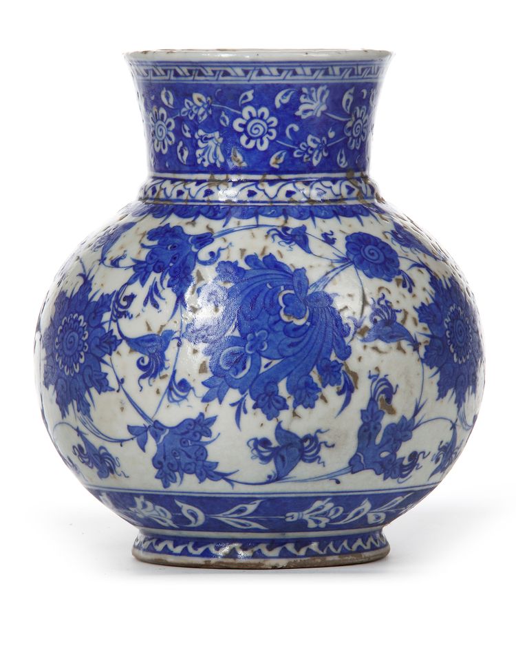 THE STYLE OF BABA NAKKAS IZNIK BLUE AND WHITE JAR, 20TH CENTURY