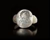 A BYZANTINE SILVER RING DEPICTING A SACRED FIGURE