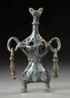 A WESTERN ASIATIC AMLASH OPENWORK BRONZE IDOL, CIRCA 1ST MILLENIUM B.C.
