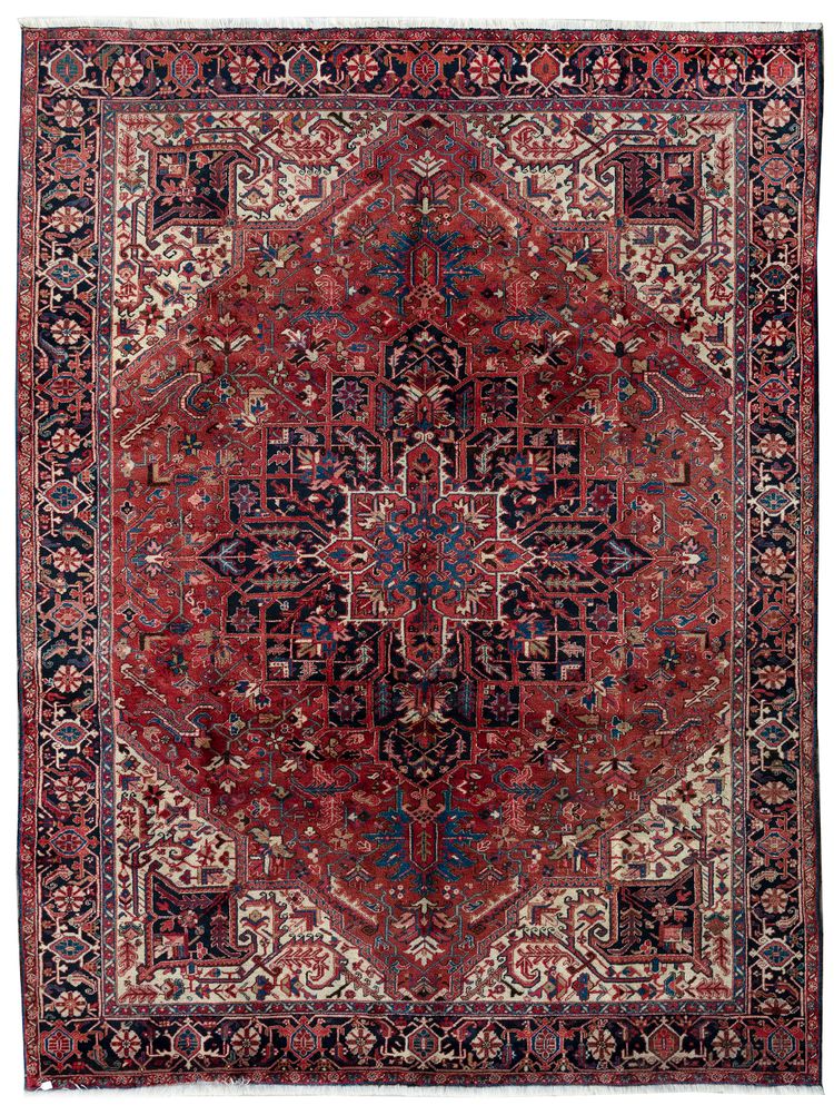A PERSIAN HERIZ CARPET