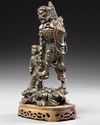 A CHINESE BRONZE FIGURE  OF LOHAN WITH A BOY, 19TH CENTURY