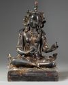 A Chinese bronze figure of Guanyin