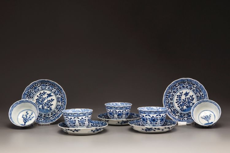 Five blue and white porcelain cups and saucers