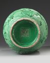 A CHINESE MOLDED GREEN GLAZED 'DRAGON' VASE