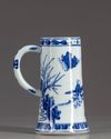 A Chinese blue and white mug