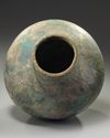 A large Islamic Seljuq turquoise glazed baluster vase