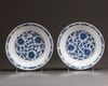 A pair of Chinese blue and white 'lotus' dishes