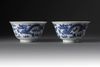 A pair of blue and white 'dragon and phoenix' bowls