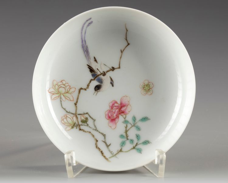 A Chinese famille rose 'bird and flower' saucer