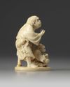A Japanese ivory okimono of two figures and a frog