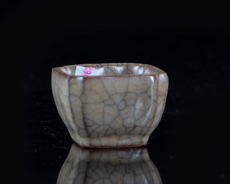 A Chinese crackle-glazed small square-section cup