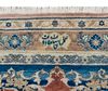 A SIGNED TEBRIZ HAJI JELILI CARPET, 1920