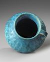 A TURQUOISE BLUE GLAZED POTTERY JUG, PERSIA-KASHAN, 12TH CENTURY