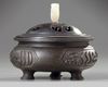 A CHINESE BRONZE TRIPOD CENSER FOR THE ISLAMIC MARKET, QING DYNASTY (1644-1911)