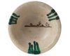 AN ABBASID TIN GLAZED POTTERY BOWL, MESOPOTAMIA, 9TH CENTURY