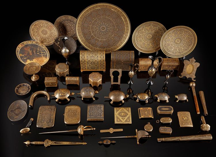 A GROUP OF FIFTY TWO TOLEDO DAMASCENED WARE ITEMS SPAIN, LATE 19TH CENTURY