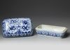 A CHINESE BLUE AND WHITE RECTANGULAR DRAGON BOX AND COVER, QING DYNASTY (1644–1911)