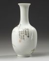A small Chinese famille rose 'bird and lotus' bottle vase