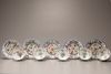 Five sets of famille verte cups and saucers