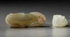 TWO CHINESE CELADON AND PALE CELADON JADE MONKEYS, 20TH CENTURY