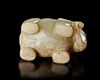 A PALE CELADON JADE ELEPHANT, CHINA, HAN DYNASTY (206 BC–220 AD)