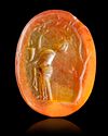 A ROMAN CARNELIAN INTAGLIO WOMAN WITH TREE, 1ST-2ND CENTURY AD