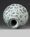 A Chinese blue and white 'scrolling peony' pear-shaped vase