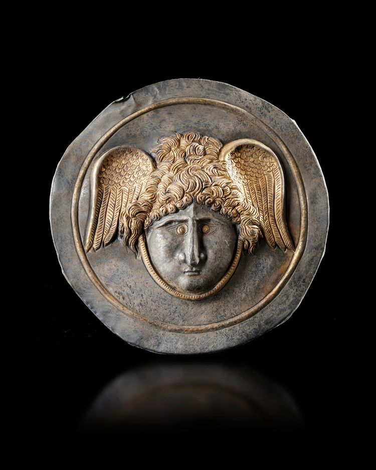 A ROMAN GILT SILVER PHALERA WITH WINGED HEAD OF MEDUSA, 1ST-2ND CENTURY AD