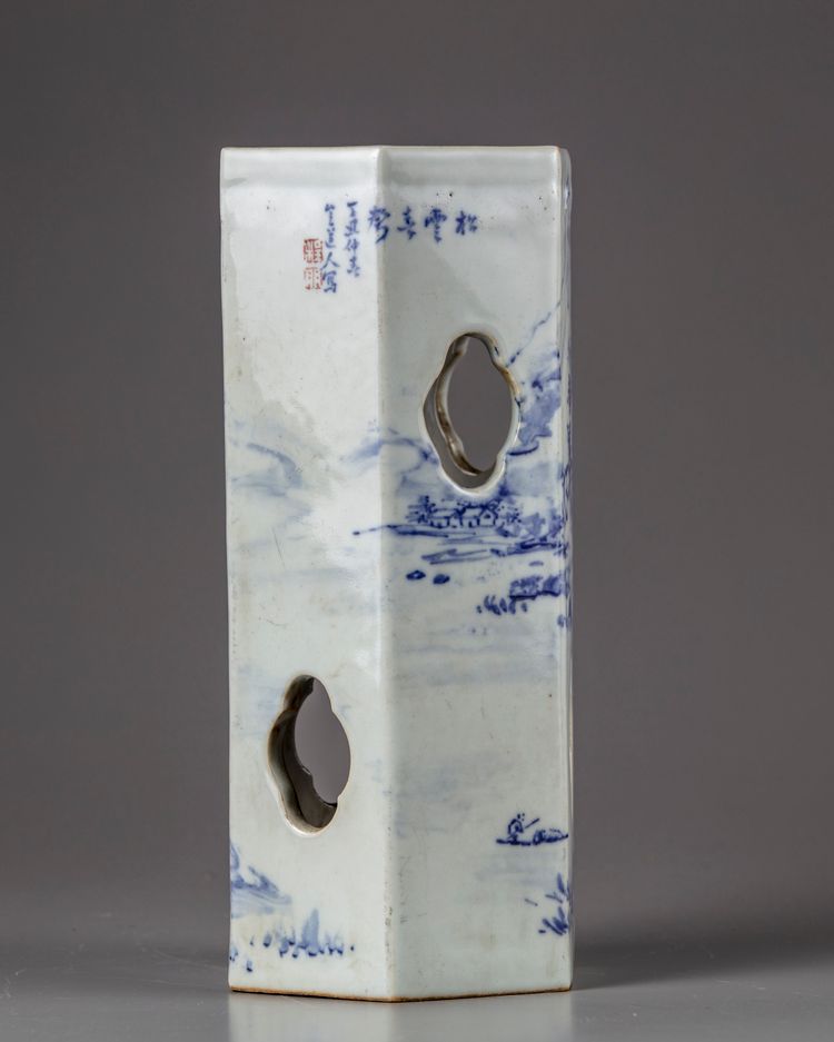 A blue and white hat stand