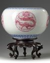 A pair of Chinese famille rose 'dragon' jardinieres