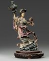 A Chinese polychrome-decorated ivory figure of a maiden