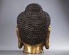 A large Chinese gilt bronze buddha head